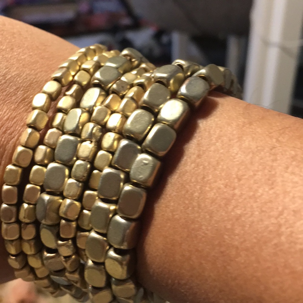Set of Fossil gold bracelets